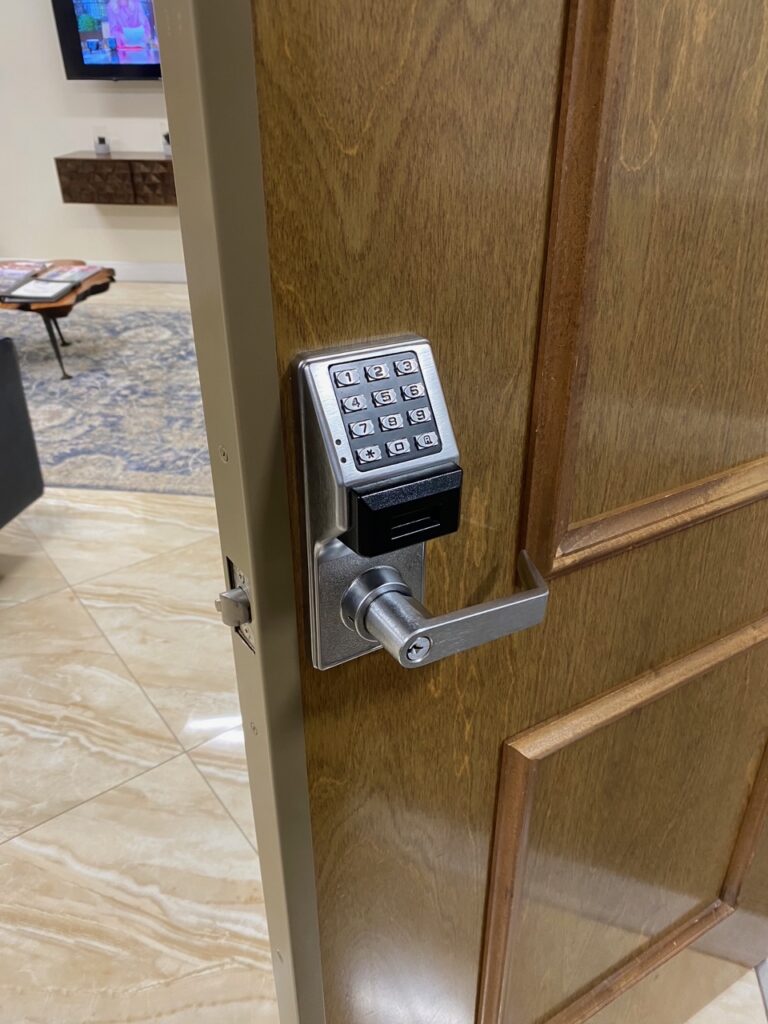Installation of an Alarm Lock Trilogy PDL4100 electronic privacy keypad lock by 24/7 Super Locksmith, your expert Commercial Locksmith in West Palm Beach, FL. We specialize in keyless entry systems and Lock Repair in Delray Beach, FL for commercial offices and facilities.